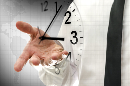 Businessman navigating virtual clock in interface. Concept of time management.